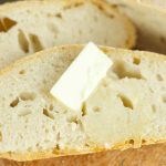 No Knead Crusty Bread - Only 4 ingredients and baked right in the dutch oven. This crusty bread is easy to make, delicious and perfect with slab of butter.